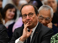 Former President of the Republic Francois Hollande and Mayor of Vaulx en Velin Helene Geoffroy meet in Lyon, France, on November 10, 2024, f...