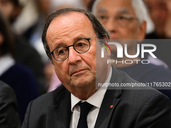 Former President of the Republic Francois Hollande and Mayor of Vaulx en Velin Helene Geoffroy meet in Lyon, France, on November 10, 2024, f...