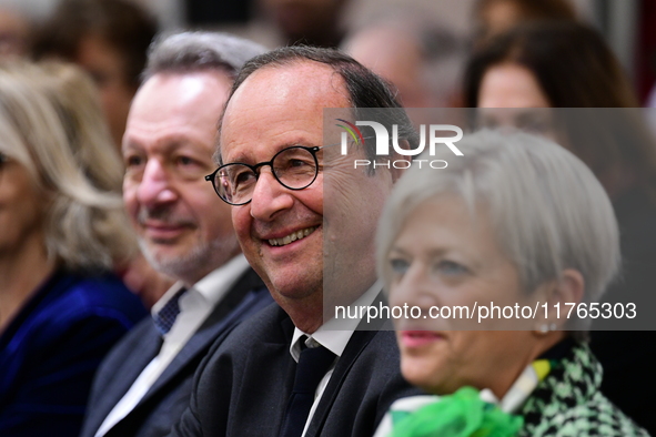 Former President of the Republic Francois Hollande and Mayor of Vaulx en Velin Helene Geoffroy meet in Lyon, France, on November 10, 2024, f...