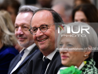 Former President of the Republic Francois Hollande and Mayor of Vaulx en Velin Helene Geoffroy meet in Lyon, France, on November 10, 2024, f...