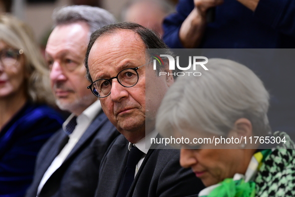 Former President of the Republic Francois Hollande and Mayor of Vaulx en Velin Helene Geoffroy meet in Lyon, France, on November 10, 2024, f...