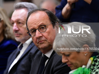 Former President of the Republic Francois Hollande and Mayor of Vaulx en Velin Helene Geoffroy meet in Lyon, France, on November 10, 2024, f...