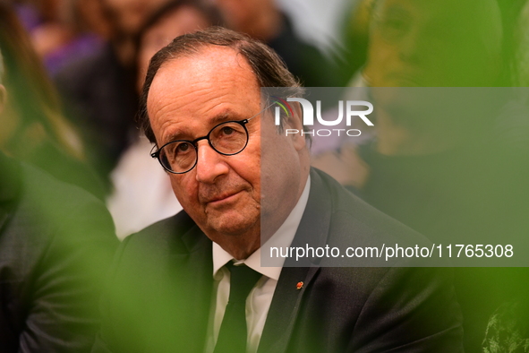 Former President of the Republic Francois Hollande and Mayor of Vaulx en Velin Helene Geoffroy meet in Lyon, France, on November 10, 2024, f...