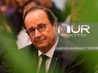 Former President of the Republic Francois Hollande and Mayor of Vaulx en Velin Helene Geoffroy meet in Lyon, France, on November 10, 2024, f...