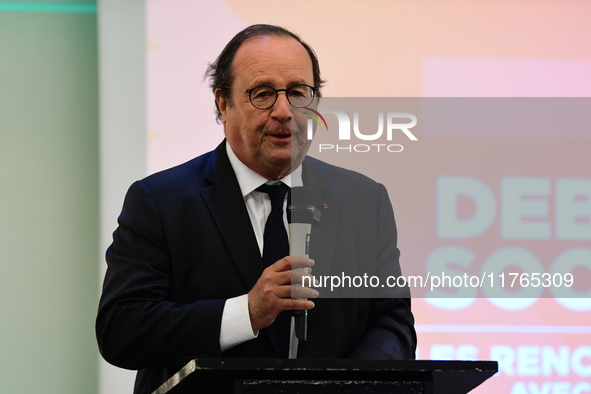 Former President of the Republic Francois Hollande and Mayor of Vaulx en Velin Helene Geoffroy meet in Lyon, France, on November 10, 2024, f...