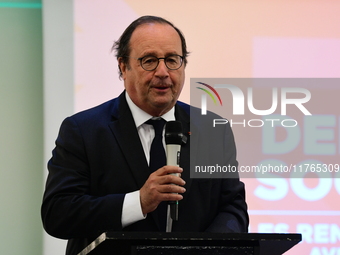 Former President of the Republic Francois Hollande and Mayor of Vaulx en Velin Helene Geoffroy meet in Lyon, France, on November 10, 2024, f...