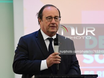 Former President of the Republic Francois Hollande and Mayor of Vaulx en Velin Helene Geoffroy meet in Lyon, France, on November 10, 2024, f...