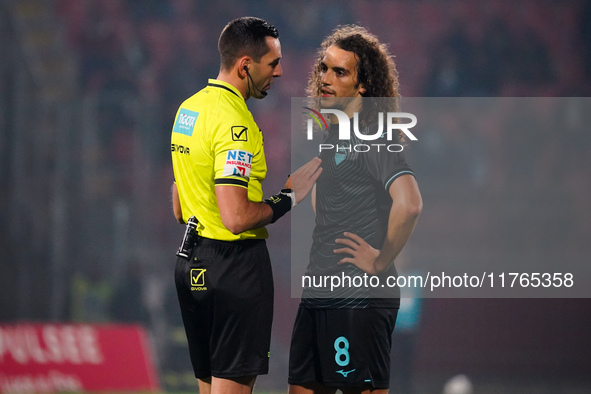 Matteo Guendouzi and Andrea Colombo, referee, are present during the match between AC Monza and SS Lazio in Serie A at U-Power Stadium in Mo...