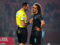 Matteo Guendouzi and Andrea Colombo, referee, are present during the match between AC Monza and SS Lazio in Serie A at U-Power Stadium in Mo...