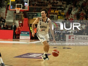 Alessandro Pajola of Virtus Bologna participates in the LBA Italy Championship match between Openjobmetis Varese and Virtus Bologna in Vares...