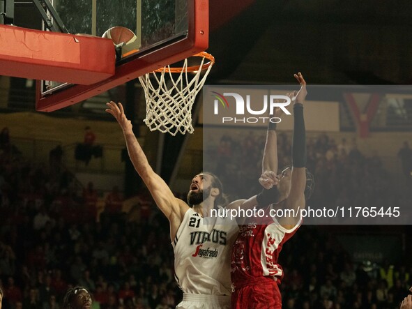 Tornik'e Shengelia of Virtus Bologna and Kaodirichi Akobundu-Ehiogu of Openjobmetis Varese participate in the LBA Italy Championship match b...