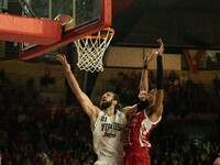 Tornik'e Shengelia of Virtus Bologna and Kaodirichi Akobundu-Ehiogu of Openjobmetis Varese participate in the LBA Italy Championship match b...