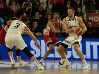 Ante Zizic of Virtus Bologna and Kaodirichi Akobundu-Ehiogu of Openjobmetis Varese compete during the LBA Italy Championship match between O...