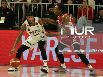 Will Clyburn of Virtus Bologna and Jaron Johnson of Openjobmetis Varese compete during the LBA Italy Championship match between Openjobmetis...