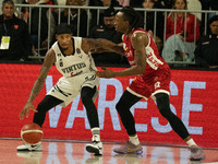 Will Clyburn of Virtus Bologna and Jaron Johnson of Openjobmetis Varese compete during the LBA Italy Championship match between Openjobmetis...