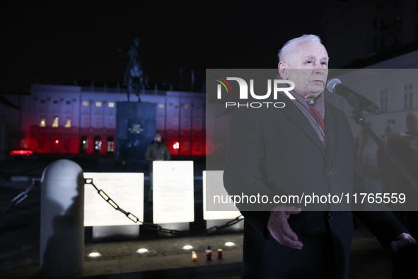 Law and Justice party leader Jaroslaw Kaczynski speaks in front of the Presidential Palace during the march a day ahead of the Poland Indepe...