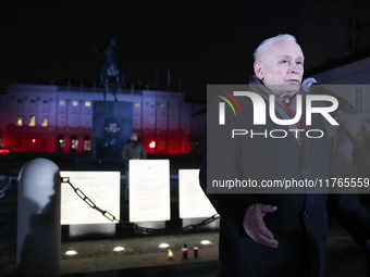 Law and Justice party leader Jaroslaw Kaczynski speaks in front of the Presidential Palace during the march a day ahead of the Poland Indepe...