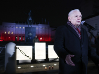 Law and Justice party leader Jaroslaw Kaczynski speaks in front of the Presidential Palace during the march a day ahead of the Poland Indepe...