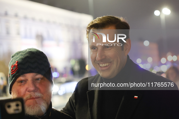 Law and Justice party politician Tobiasz Bochenski after the march a day ahead of the Poland Independence Day in Warsaw, Poland on November...