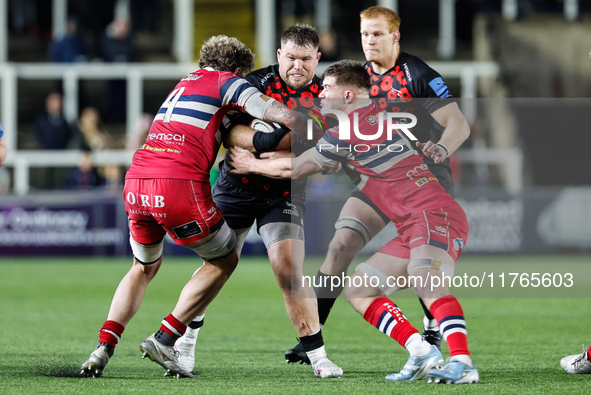 Richard Palframan of Newcastle Falcons is tackled during the Premiership Cup Pool A match between Newcastle Falcons and Doncaster Knights at...