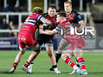 Richard Palframan of Newcastle Falcons is tackled during the Premiership Cup Pool A match between Newcastle Falcons and Doncaster Knights at...