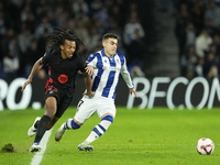 Jules Kounde centre-back of Barcelona and France and Ander Barrenetxea left winger of Real Sociedad and Spain compete for the ball during th...