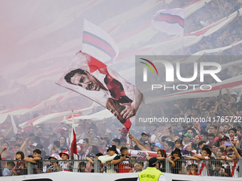 Fans of River Plate show their support for their team before a Liga Profesional 2024 match against Barracas Central at the Estadio Antonio V...