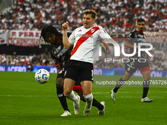 Facundo Colidio of River Plate competes for the ball against Carlos Sanchez of Barracas Central during a Liga Profesional 2024 match between...