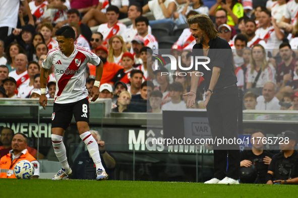 Ruben Insua, coach of Barracas Central, gives instructions to his team players during a Liga Profesional 2024 match between River Plate and...