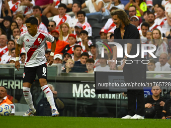 Ruben Insua, coach of Barracas Central, gives instructions to his team players during a Liga Profesional 2024 match between River Plate and...