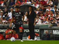 Ruben Insua, coach of Barracas Central, gives instructions to his team players during a Liga Profesional 2024 match between River Plate and...