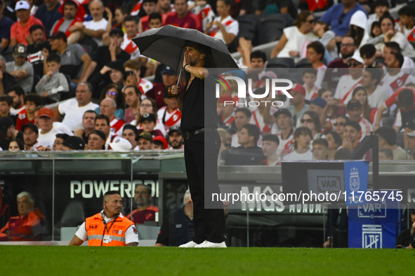 Ruben Insua, coach of Barracas Central, gives instructions to his team players during a Liga Profesional 2024 match between River Plate and...