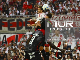 Facundo Colidio of River Plate competes for the ball against Nicolas Caparro of Barracas Central during a Liga Profesional 2024 match betwee...