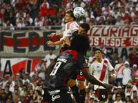 Facundo Colidio of River Plate competes for the ball against Nicolas Caparro of Barracas Central during a Liga Profesional 2024 match betwee...