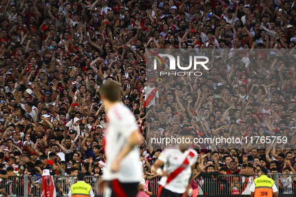 Fans of River Plate show their support for their team during a Liga Profesional 2024 match against Barracas Central at the Estadio Antonio V...