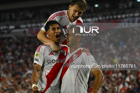 Maxi Meza, Pity Martinez, and Facundo Colidio of River Plate celebrate after scoring the team's first goal during a Liga Profesional 2024 ma...