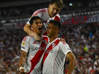 Maxi Meza, Pity Martinez, and Facundo Colidio of River Plate celebrate after scoring the team's first goal during a Liga Profesional 2024 ma...