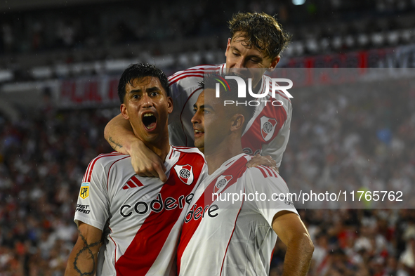 Maxi Meza, Pity Martinez, and Facundo Colidio of River Plate celebrate after scoring the team's first goal during a Liga Profesional 2024 ma...