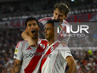 Maxi Meza, Pity Martinez, and Facundo Colidio of River Plate celebrate after scoring the team's first goal during a Liga Profesional 2024 ma...