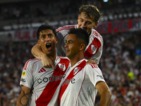 Maxi Meza, Pity Martinez, and Facundo Colidio of River Plate celebrate after scoring the team's first goal during a Liga Profesional 2024 ma...