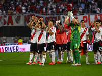 Claudio Echeverry and Franco Armani of River Plate celebrate with their teammates after winning a Liga Profesional 2024 match between River...