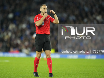 Referee Guillermo Cuadra Fernandez during the LaLiga match between Real Sociedad and FC Barcelona at Reale Arena on November 10, 2024 in San...