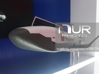 A model of China's cargo space shuttle ''HL 1'' is on display at Zhuhai Air Show Center in Zhuhai, Guangdong province, China, on November 10...