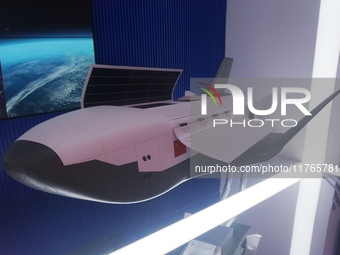 A model of China's cargo space shuttle ''HL 1'' is on display at Zhuhai Air Show Center in Zhuhai, Guangdong province, China, on November 10...