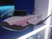 A model of China's cargo space shuttle ''HL 1'' is on display at Zhuhai Air Show Center in Zhuhai, Guangdong province, China, on November 10...