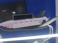 A model of China's cargo space shuttle ''HL 1'' is on display at Zhuhai Air Show Center in Zhuhai, Guangdong province, China, on November 10...