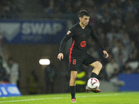 Pedri central midfield of Barcelona and Spain controls the ball during the LaLiga match between Real Sociedad and FC Barcelona at Reale Aren...