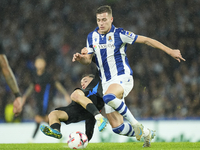 Luka Sucic central midfield of Real Sociedad and Croatia and Marc Casado defensive midfield of Barcelona and Spain compete for the ball duri...