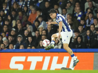 Aramburu of Real Sociedad and Spain controls the ball during the LaLiga match between Real Sociedad and FC Barcelona at Reale Arena on Novem...