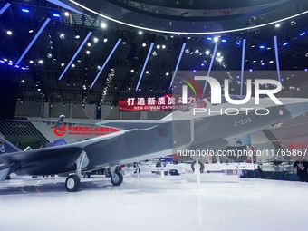 A model of the J-20S two-seat stealth fighter jet is pictured at the Zhuhai Air Show Center in Zhuhai, China, on November 10, 2024. (